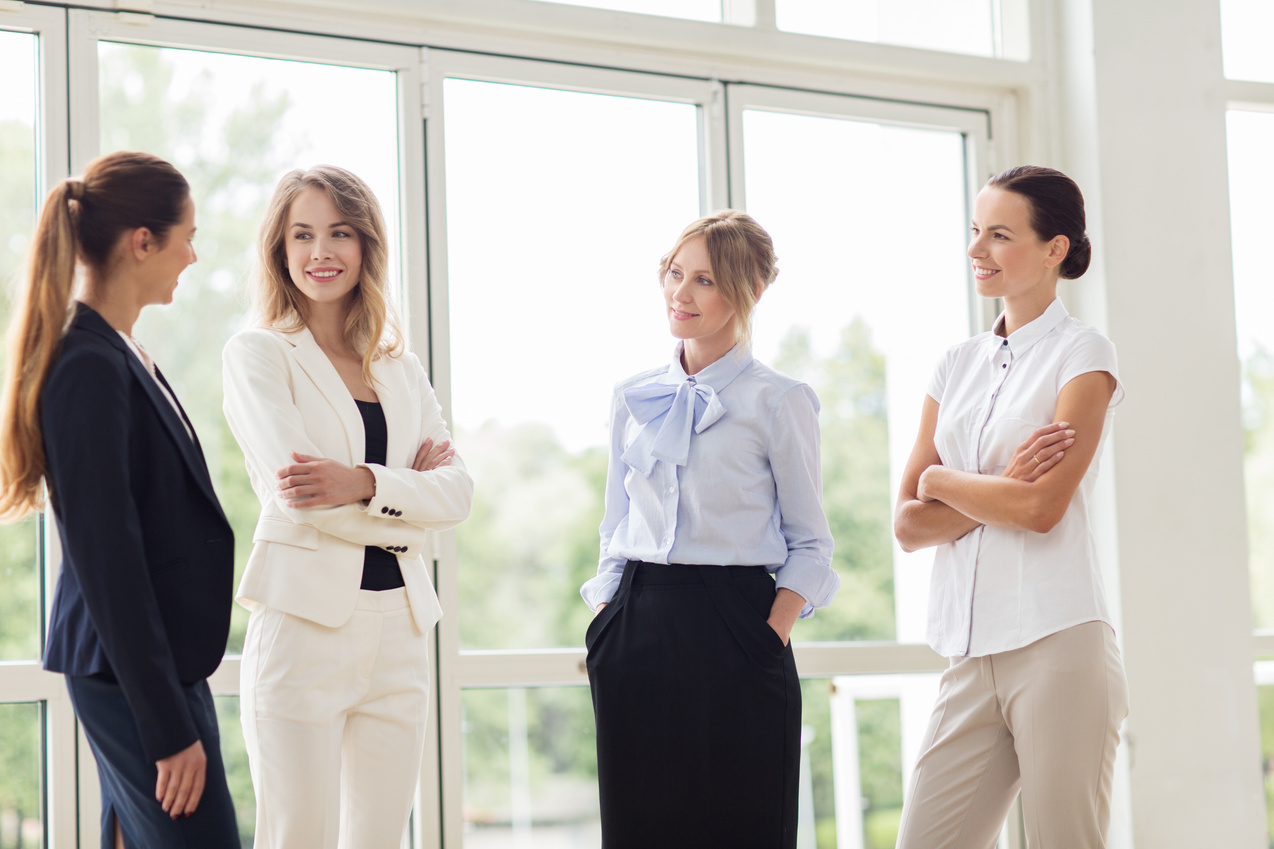 Business Women Meeting at Office and Talking